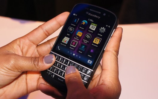 Blackberry Q10, touchscreen phone with physical keypad.